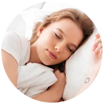 Girl is sleeping peacefully on bed